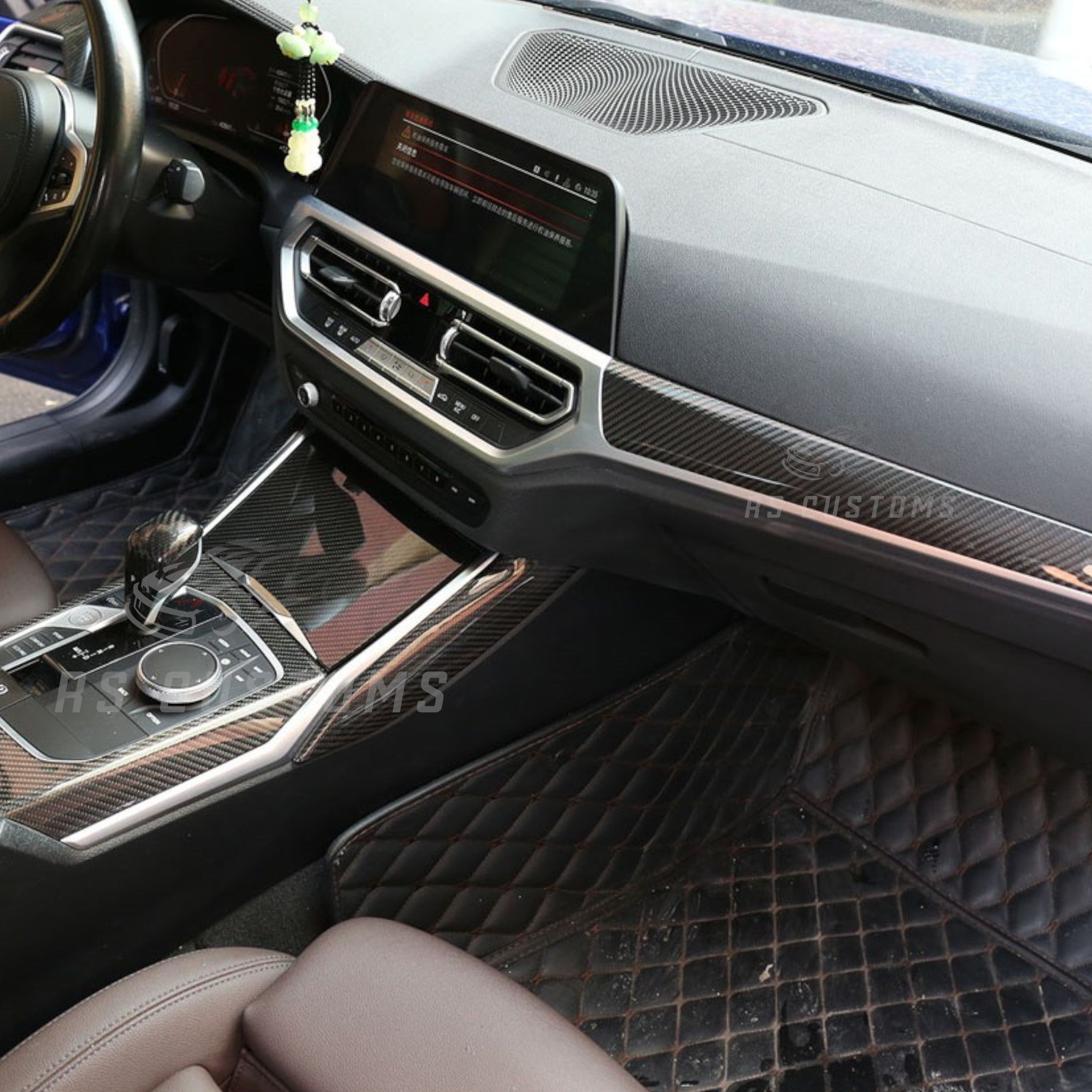 RS CUSTOMS carbon fiber interior trim kit for car dashboard and console. High-gloss finish with intricate weave pattern.